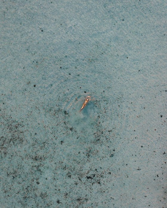 Floating in Maupiti lagoon by Dancing the Earth