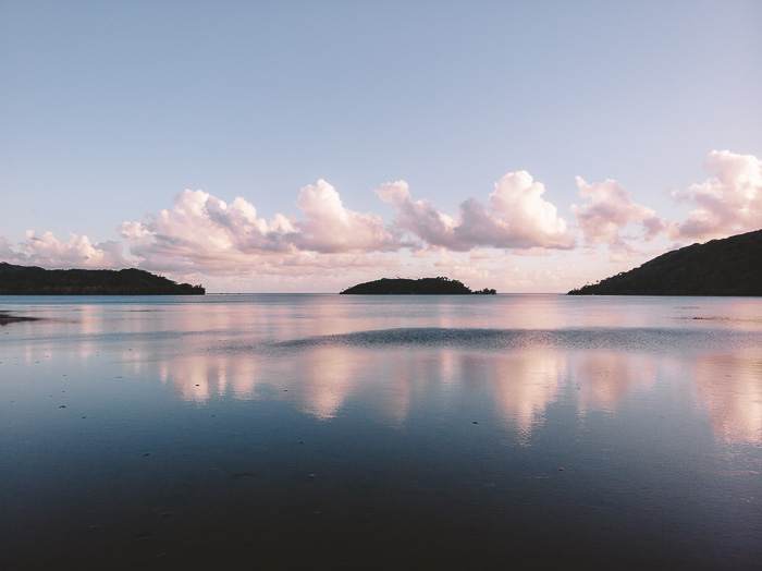 French Polynesia travel guide sunrise over the lagoon at Pension Tupuna by Dancing the Earth