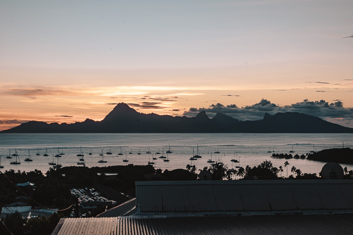 French Polynesia travel guide sunset on Moorea island from Tahiti by Dancing the Earth