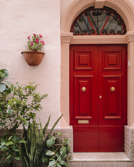 Vittoriosa red door by Dancing the Earth