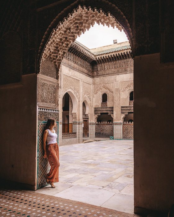Morocco travel guide Fes Bou Inania Medersa framed by door by Dancing the Earth