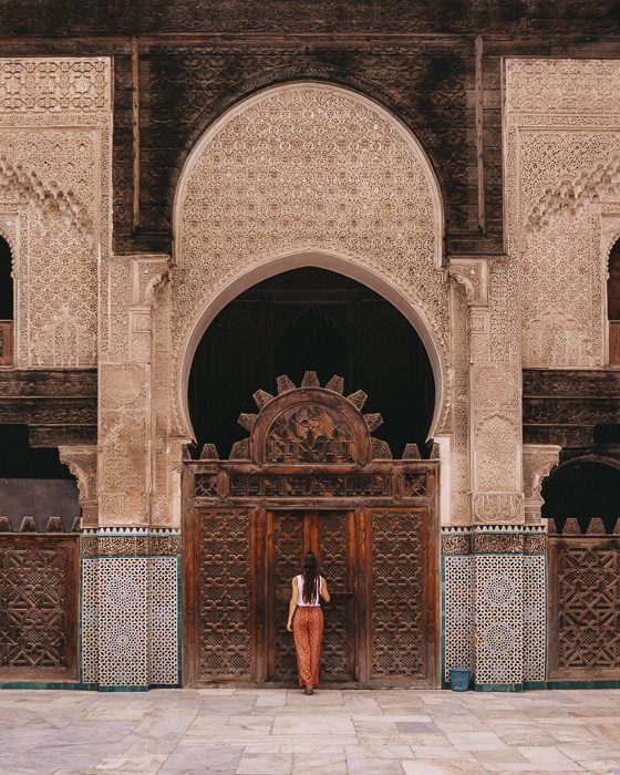 Morocco travel guide Fes Bou Inania Medersa main door by Dancing the Earth