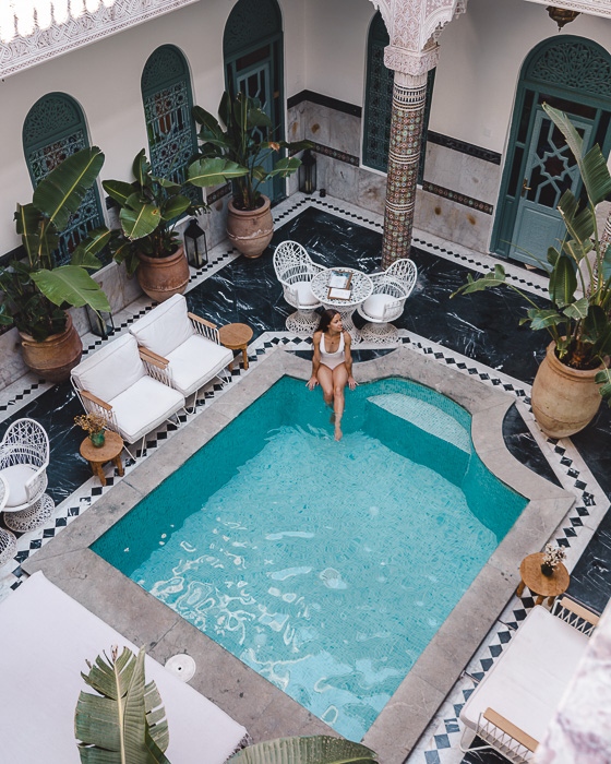 Chilling by the pool of riad Ksar Kasbah in Marrakesh by Dancing the Earth