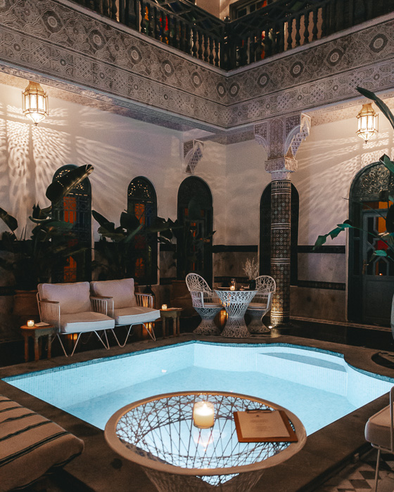 Morocco travel guide Marrakesh Ksar Kasbah riad pool by night by Dancing the Earth
