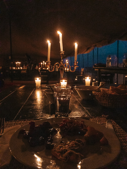 Morocco travel guide Scarabeo Camp candlelit dinner by Dancing the Earth