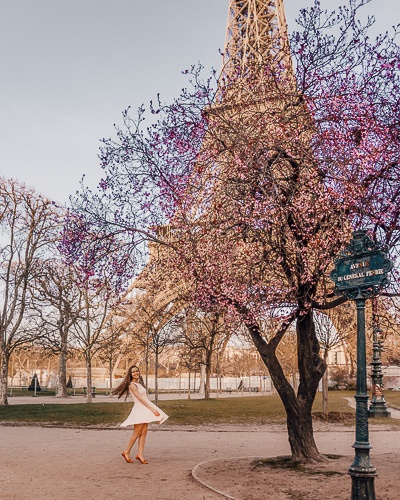 Spring in Paris twirling under a plum tree and Eiffel Tower by Dancing the Earth