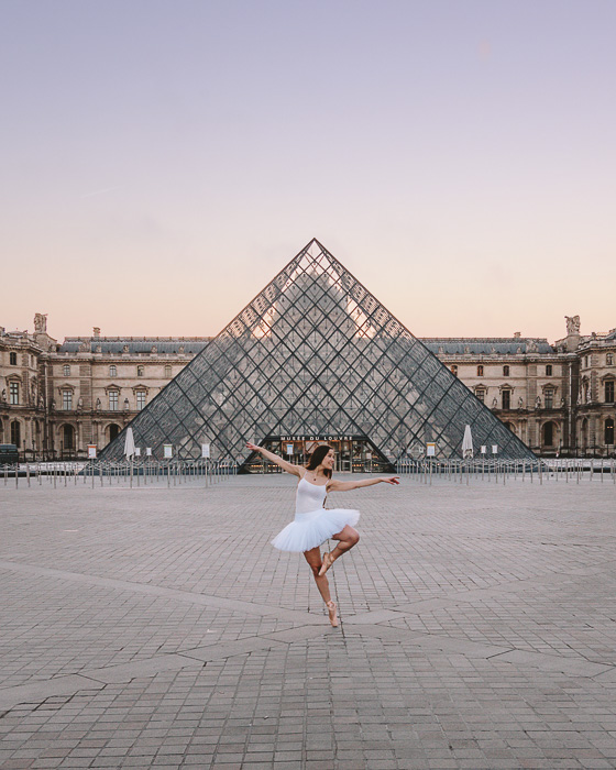 Dancing in front of the Louvre pyramid by Dancing the Earth