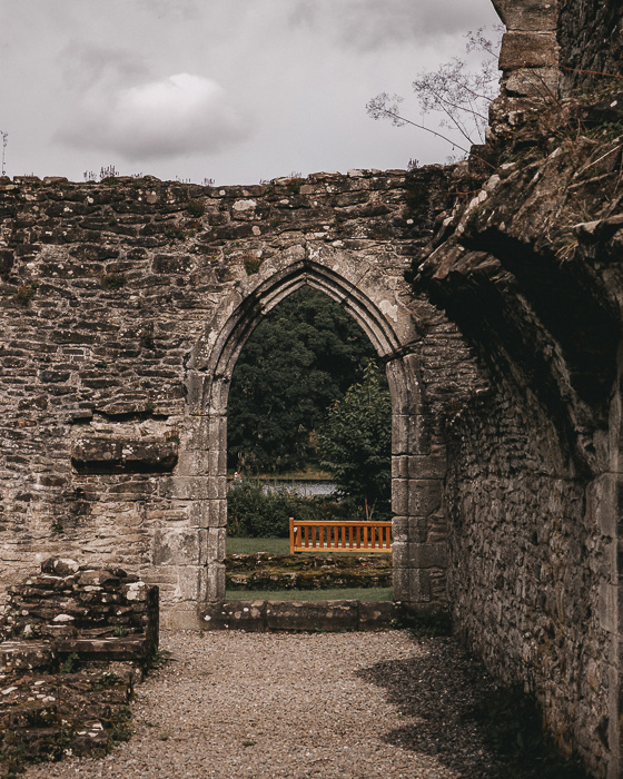 Scotland travel itinerary Inchmahome Priory door and bench by Dancing the Earth