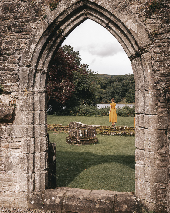 Scotland travel itinerary Inchmahome Priory framed by door by Dancing the Earth