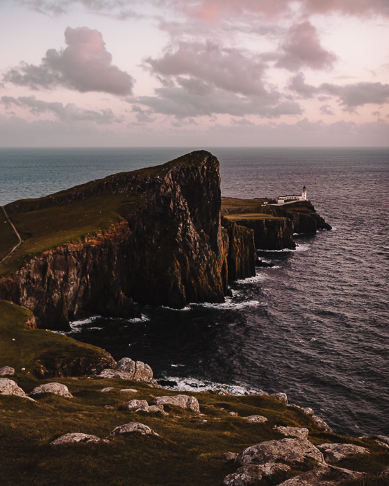 Scotland travel itinerary Isle of Skye sunset at Neist Point Lighthouse by Dancing the Earth