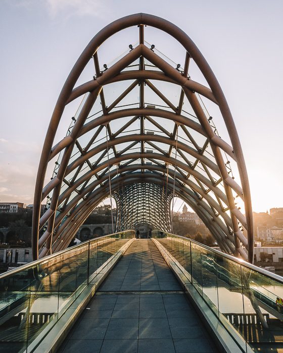 Tbilisi Peace Bridge at sunrise by Dancing the Earth