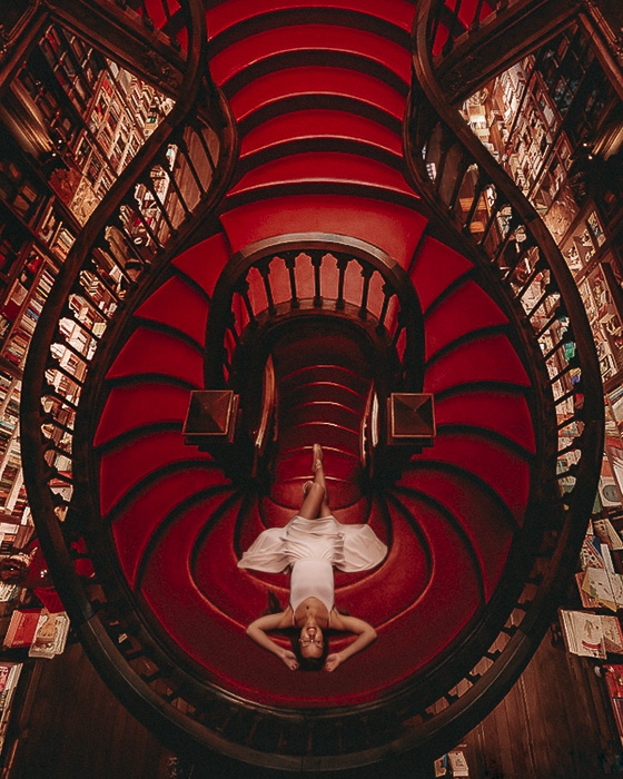 Livraria Lello staircases from upstairs by Dancing the Earth