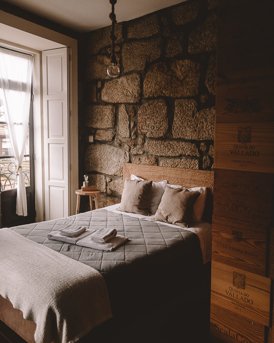 Porto weekend itinerary Bedroom at Belos Aires apartment by Dancing the Earth