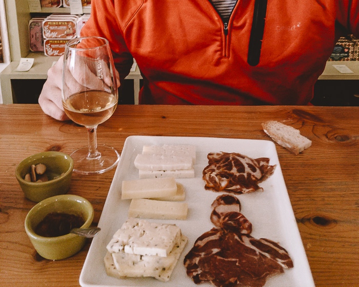 cheese and meat board at Mercearia das Flores by Dancing the Earth