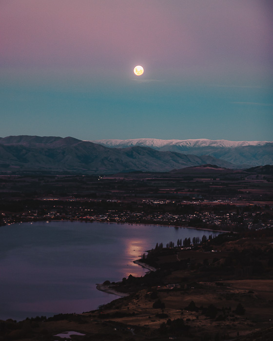 Pink sky and moon over Wanaka, Dancing the Earth