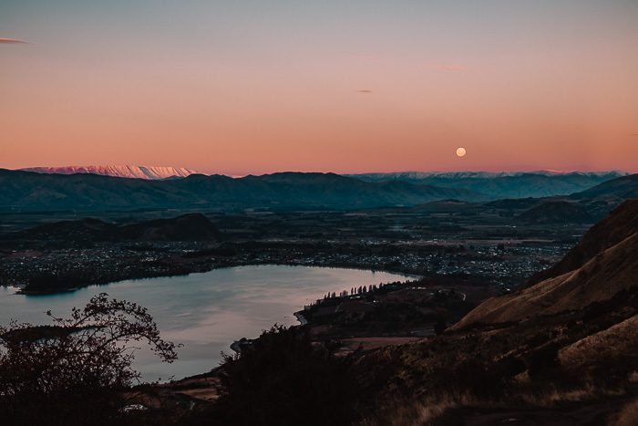 Full moon over Wanaka and the lake at sunset, Dancing the Earth
