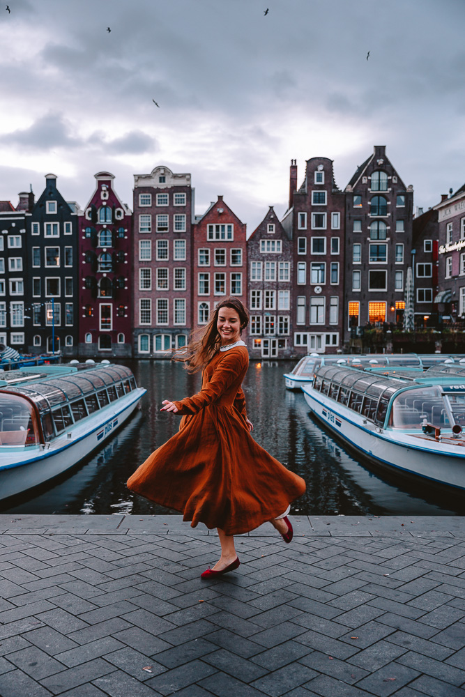 Damrak Waterfront in Amsterdam, by Dancing The Earth