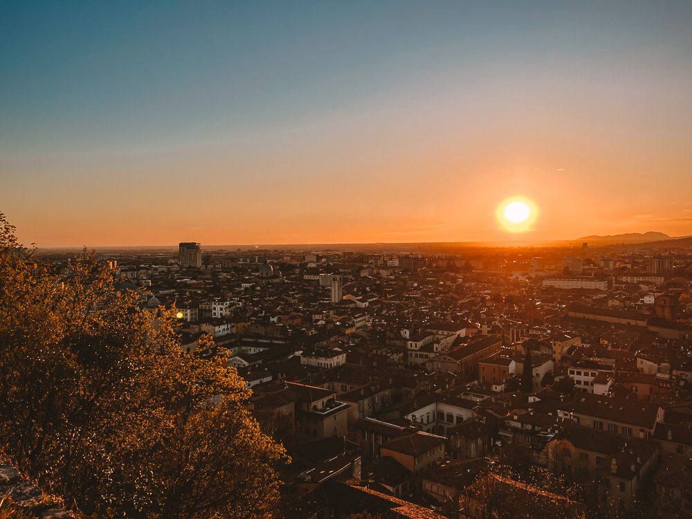 Sunset over the city from Brescia Castle, Dancing the Earth