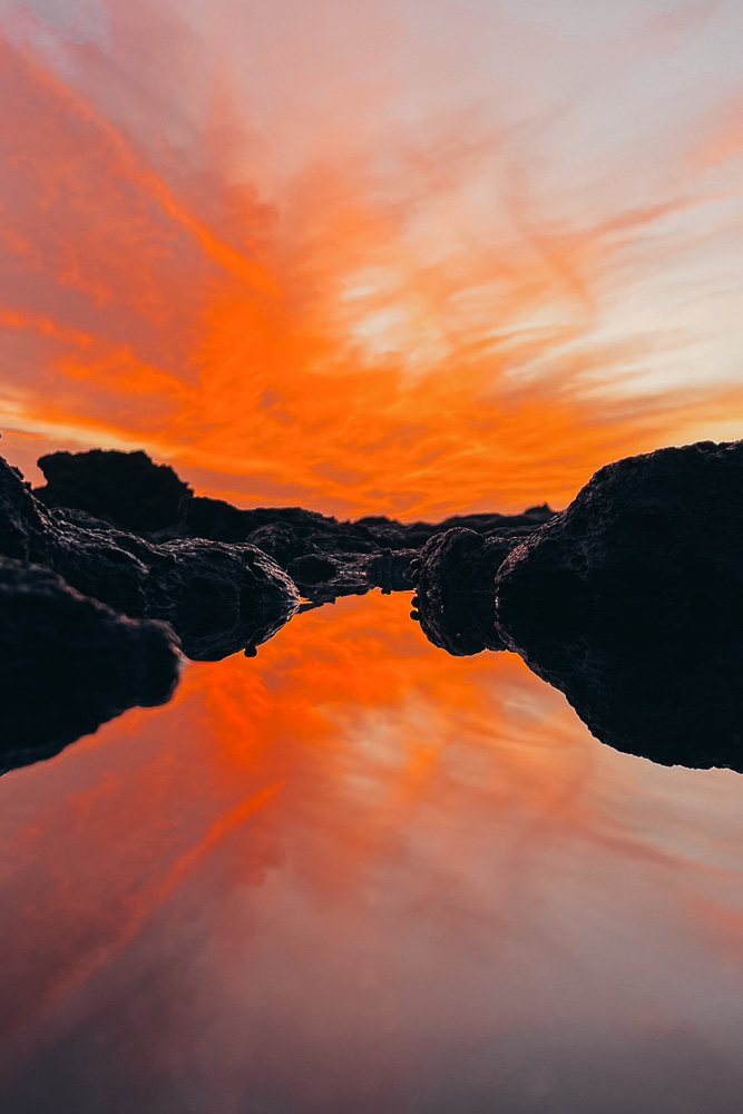 Mirror sunset from Playa de la Concha, El Cotillo, by Dancing the Earth