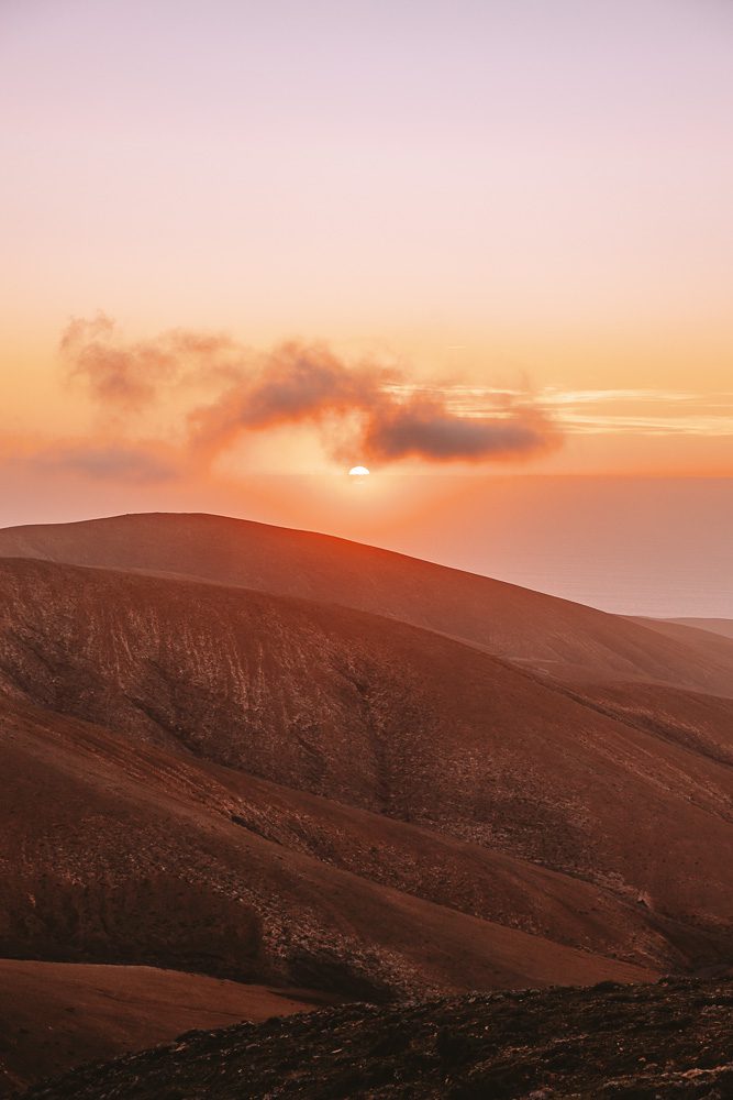 Sun setting over the sea from the Mirador Astronomico de Sicacumbre, by Dancing the Earth