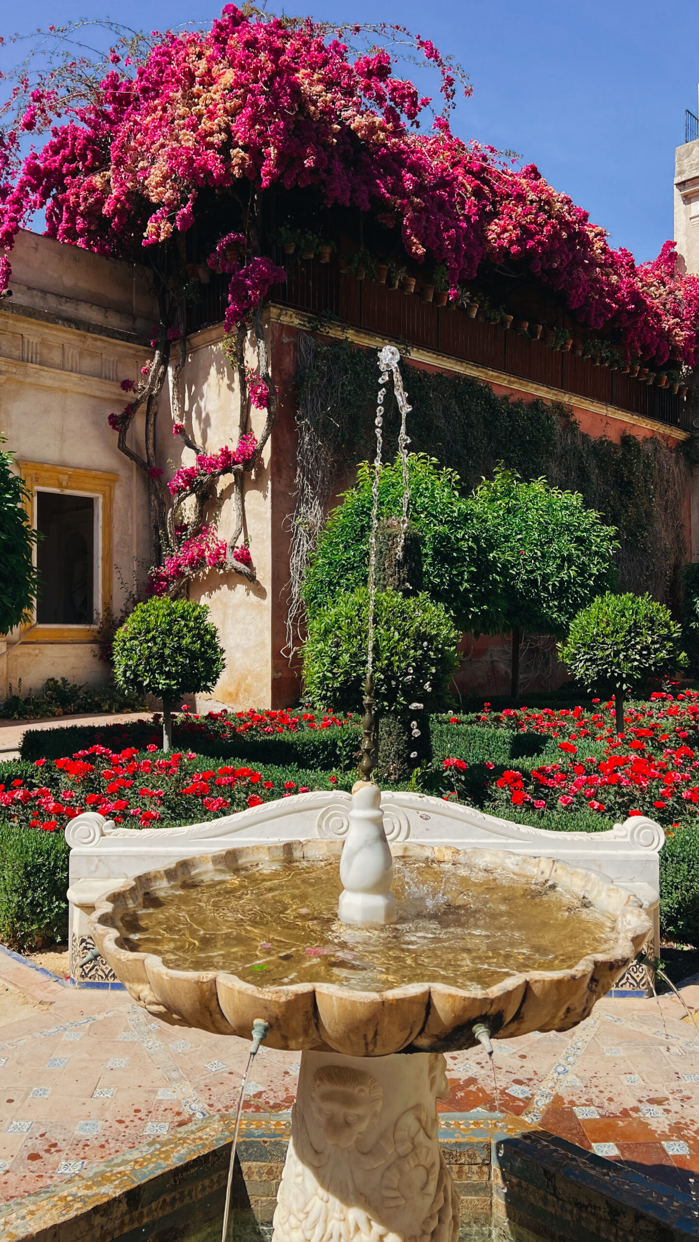 Seville weekend itinerary, Casa de Pilatos garden, by Dancing the Earth