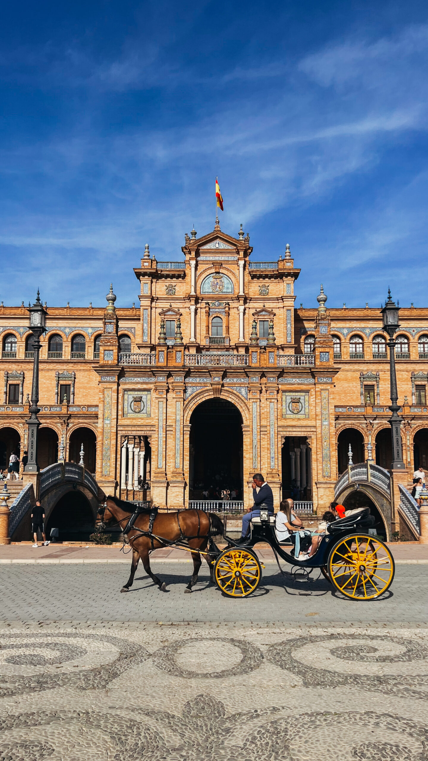 Seville weekend itinerary, horse carriage on Plaza de Espana, by Dancing the Earth