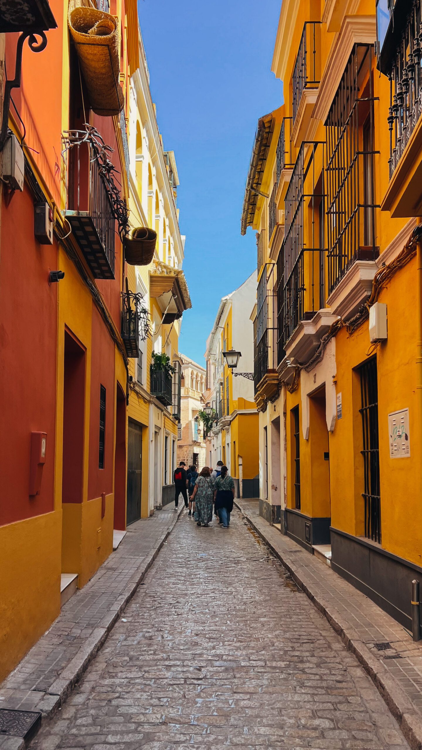 Seville weekend itinerary,, Santa Cruz colorful streets, by Dancing the Earth