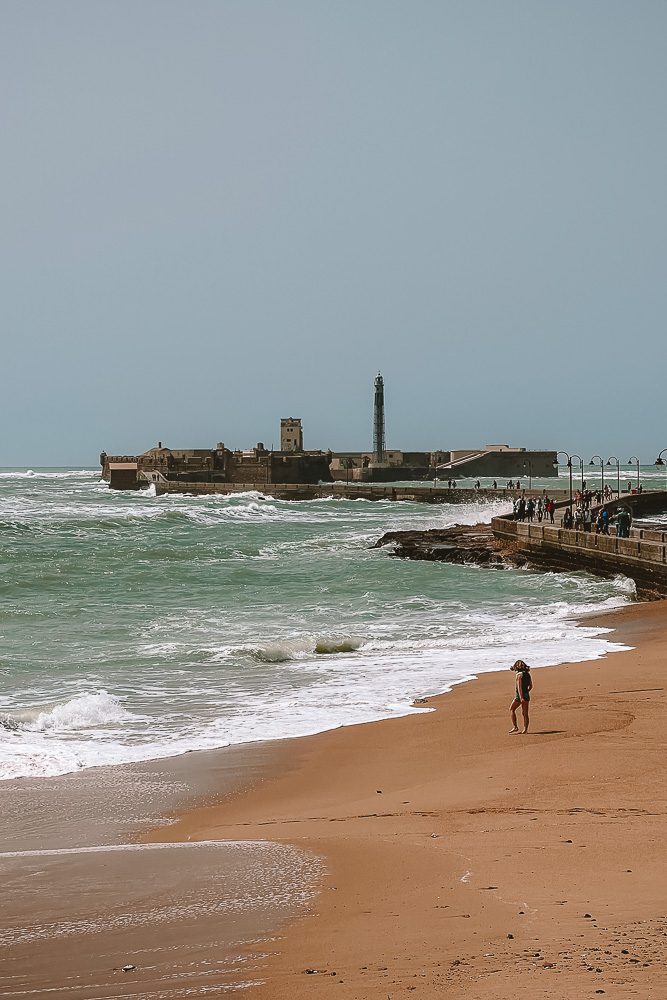 Andalusia road-trip itinerary, Cadiz Castillo San Sebastian and beach, by Dancing the Earth