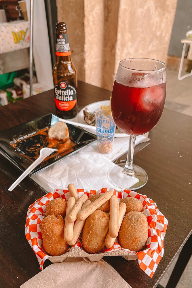 Andalusia road-trip itinerary, Cadiz Mercado Central tapas and tinto de verano, by Dancing the Earth