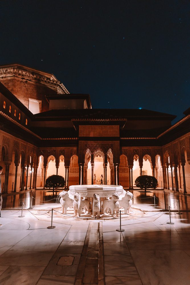 Granada weekend itinerary, Alhambra by night, fountain in patio by Dancing the Earth
