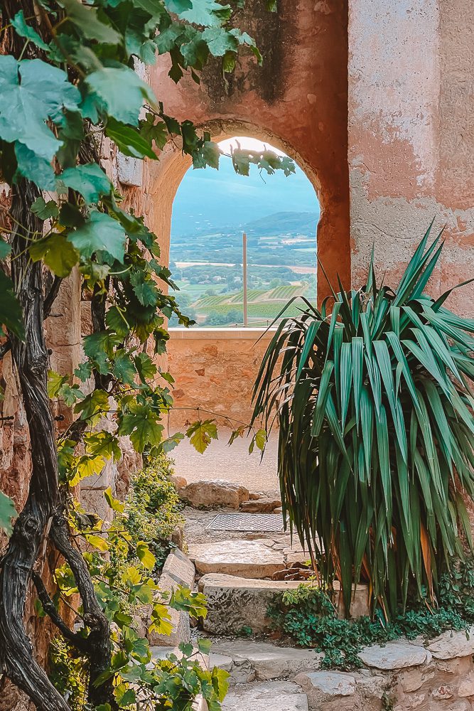 Provence Ultimate Itinerary, Roussillon belfry door and Luberon view, by Dancing the Earth